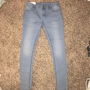 S6 Light Wash Mid Rise Skinny Jeans from H&M
